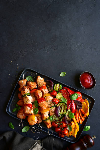 Chicken skewers kebab with grilled vegetables