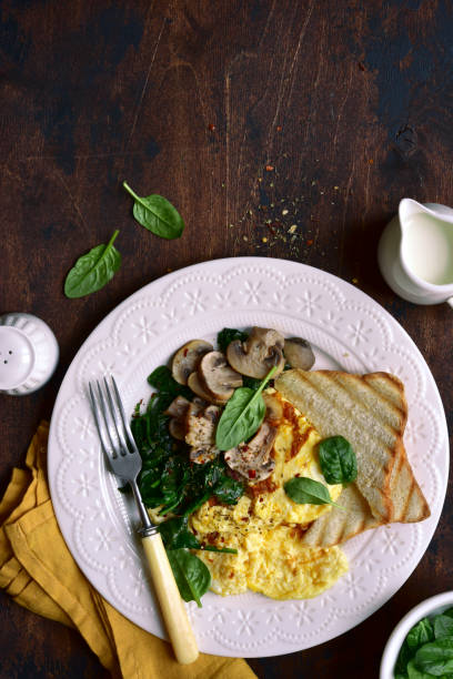 istock Omelet  with spinach , mushrooms and cheese 1339191470