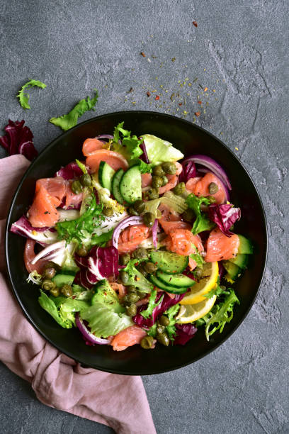 istock Fresh vegetable salad with salted salmon 1339191656