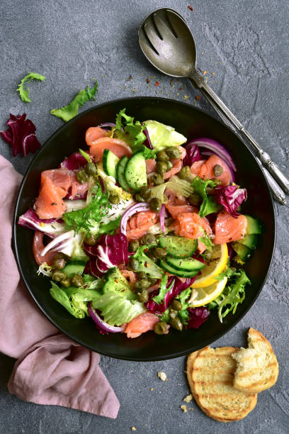 istock Fresh vegetable salad with salted salmon 1339191672