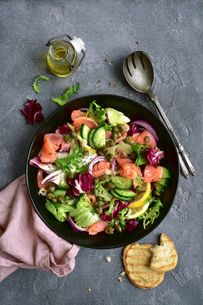 istock Fresh vegetable salad with salted salmon 1339191686