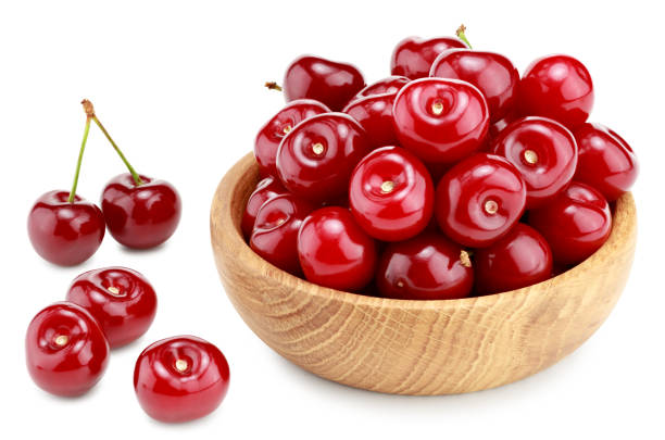 istock red cherry in wooden bowl isolated on white background. clipping path 1339192937
