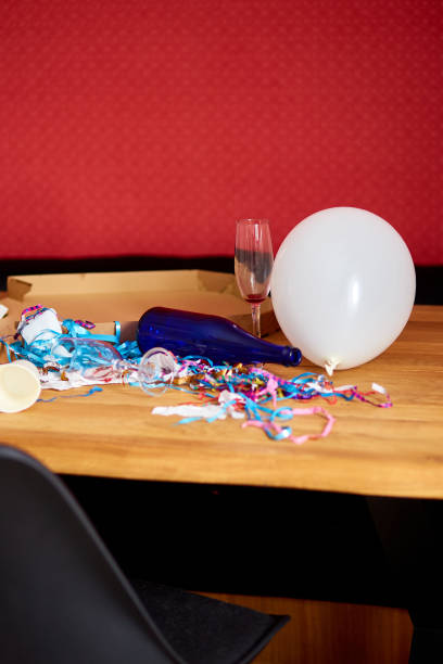 istock Messy wooden table at morning after party. 1339196279