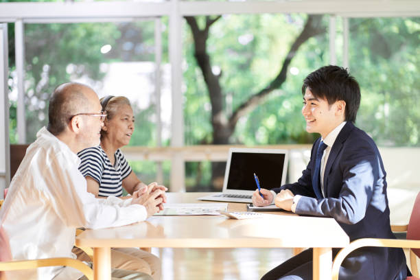 istock Professionals who give advice on inheritance to elderly couples 1339197497