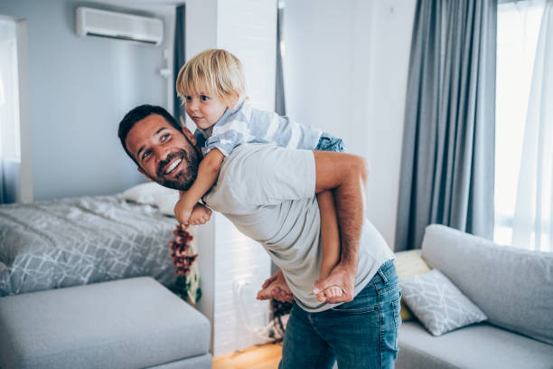 istock Father and little son at home. 1339201118