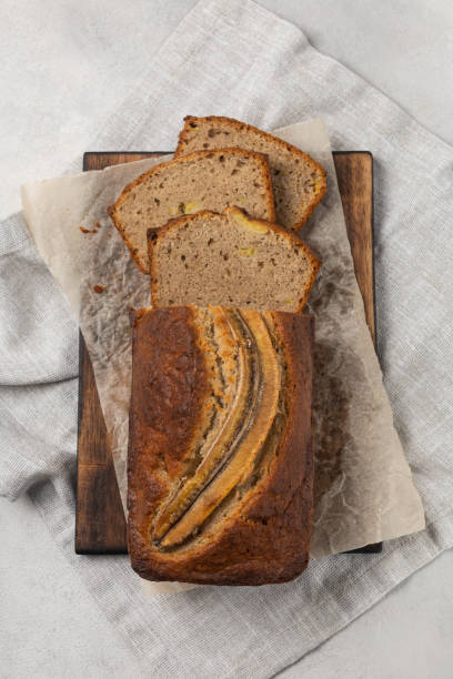 istock Sliced ready-made banana bread on white background 1339201370