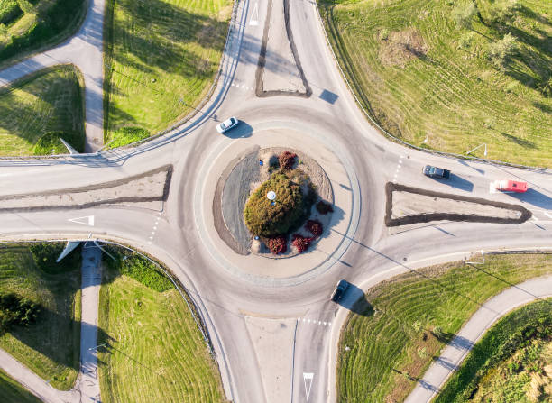 istock Roundabout and cars from above 1339203168