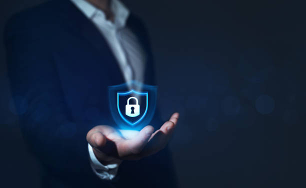 istock Businessman holding padlock in hand. Network security and data protection. Global networking connection background 1339204368