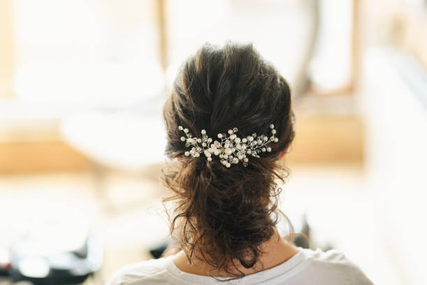 Wedding hairdo / hairstyle. Bride getting ready Wedding hair accessory. Bride's preparations. hair clip stock pictures, royalty-free photos & images