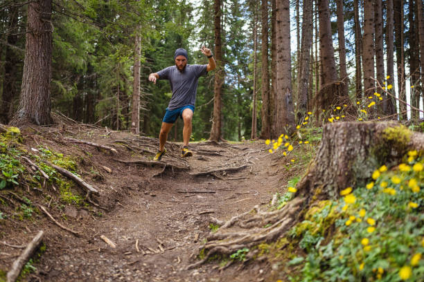 istock Man trail running in the forest 1339212986