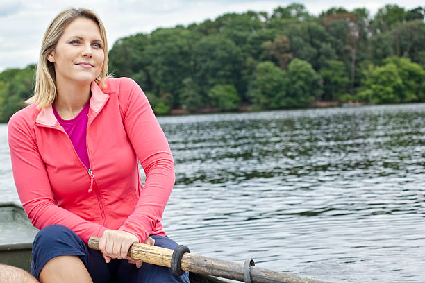 istock Woman Rowing a Boat 133921299
