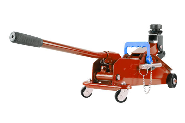 istock red hydraulic car jack isolated on white background, rised up 1339219432