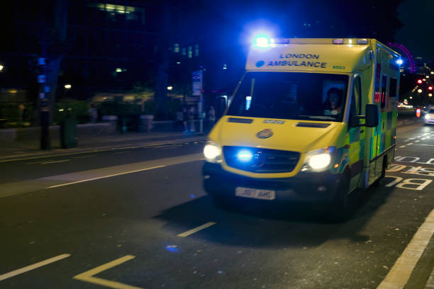 London, England - Sep 7, 2021: A London Emergency Ambulance on a road during the night