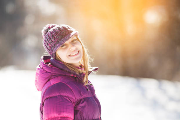 istock Joyful happy girl in a knitted hat 1339224285