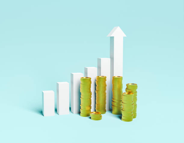 istock economic rise graph with piles of coins in front 1339225241
