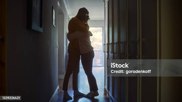 Sad Couple Embracing Comforting Each Other In Difficult Times Family Overcoming Difficulties Together Tender Moment Atmosphere Of Sadness And Tragedy Moment Of Human Drama Stock Photo - Download Image Now