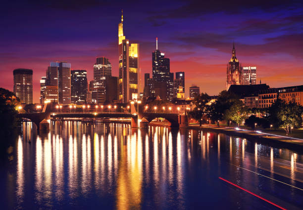 Frankfurt skyline at sunset in Germany with Meno river