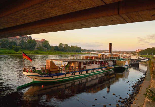 istock Dresden Elbe river and boats in Saxony Germany 1339228404