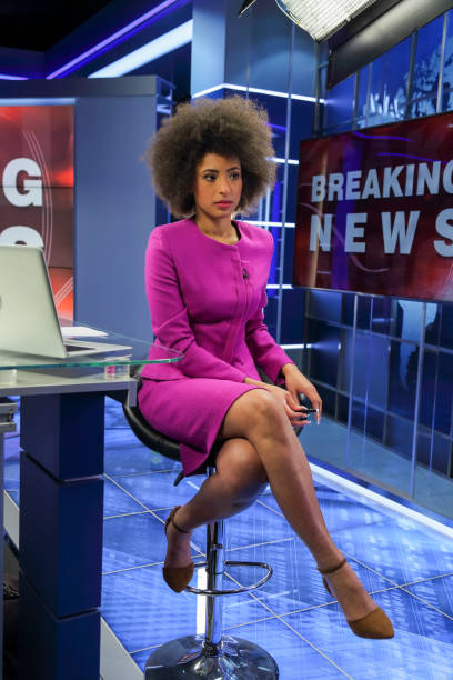 istock Breaking news female anchor 1339237230