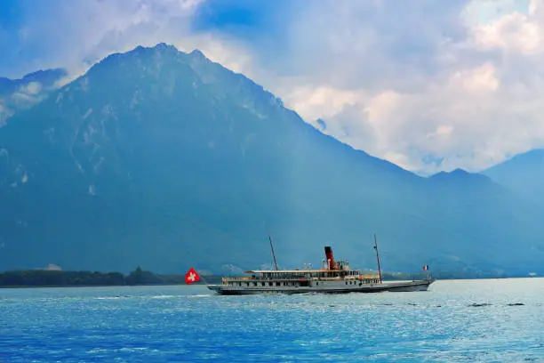 Geneve Lake Leman Geneva paddle steamer ship Switzerland with Swiss flag