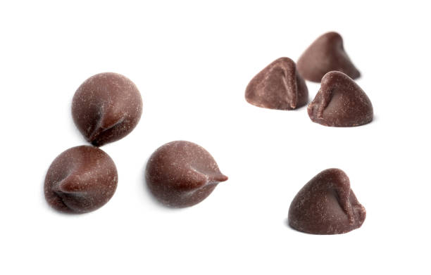istock Set of delicious chocolate chips on white background 1339241241