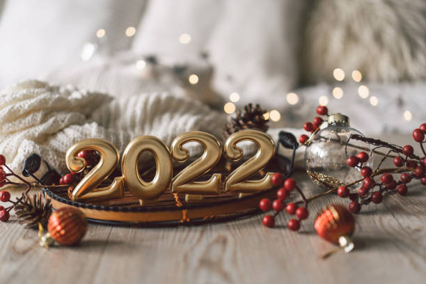 happy new years 2022. christmas background with fir tree, cones and christmas decorations. christmas holiday celebration. - decoration candle ornate composition imagens e fotografias de stock