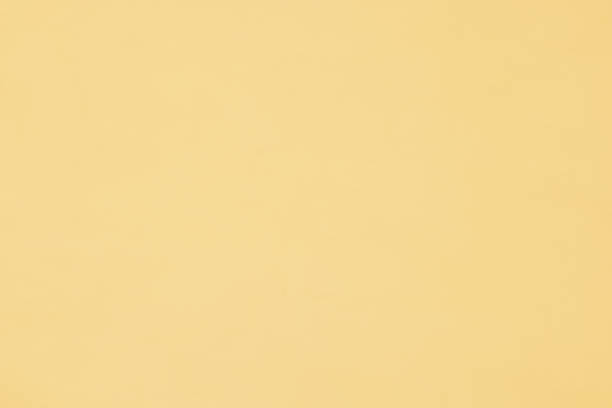 istock Part of a smooth yellow wall 1339242947
