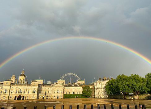 London, United Kingdom - July 28 2021: A rainbow appears over Horse Guards Parade after a day of heavy rain in London.