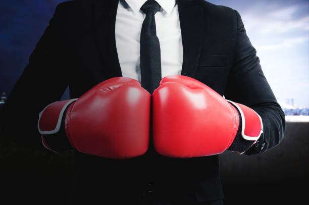istock Businessman with red boxing gloves 1339248836
