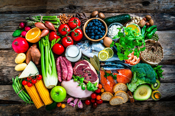 istock Large group of food shot from above on rustic table 1339249142