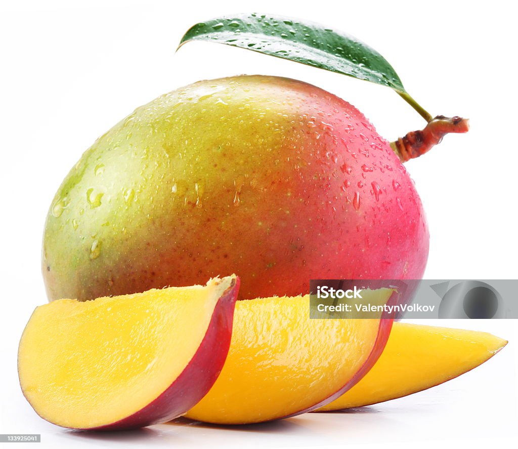 Mango con rebanadas - Foto de stock de Mango - Fruta tropical libre de derechos