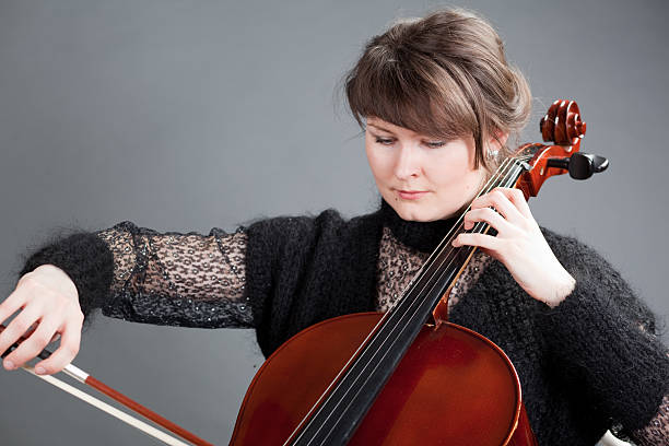 istock Young women play violoncello 133925201