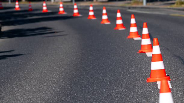 istock Traffic cones on the road. Empty street. 1339254171