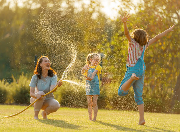 istock Happy family playing in backyard 1339254699