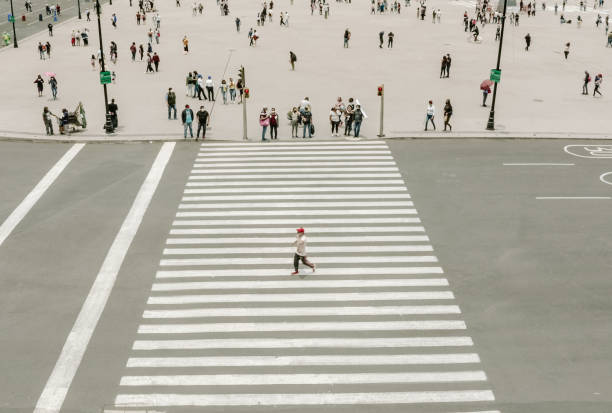 istock Man walking alone on the street 1339256128