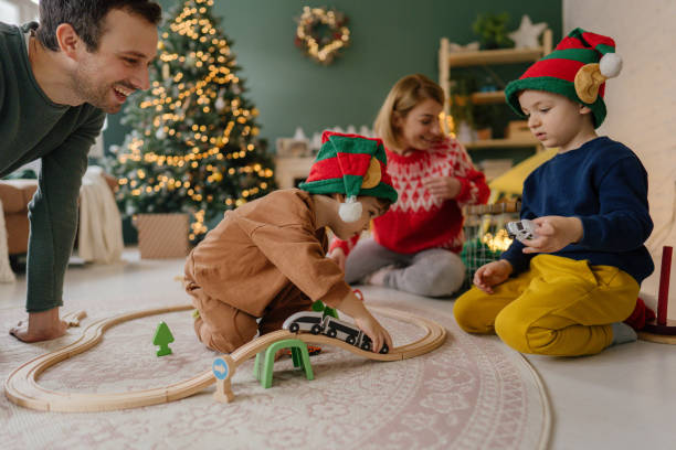 istock Little boys playing with their Christmas present 1339258587