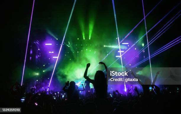 Rave Party Silhouettes Stock Photo - Download Image Now - Green Color, Dance & Electronic Music, Strobe Light