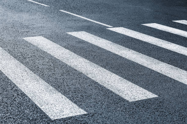 istock White lines on the city crossroad. 1339264071