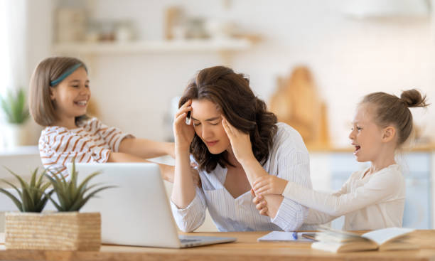 istock woman working on a laptop at home 1339267634