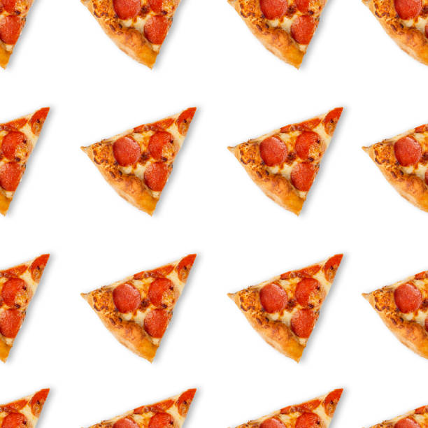 istock Seamless slice or piece of pizza pattern isolated on white background. Top view on paperoni pizza food background 1339270192
