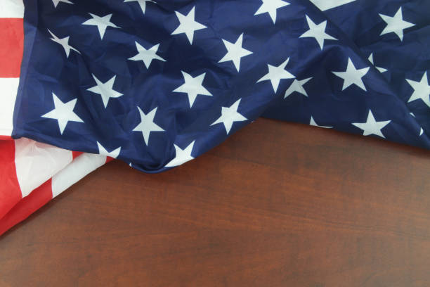 istock USA flag on wooden background. 1339274340
