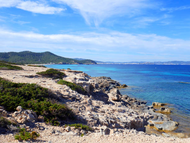 istock Panoramic view of a beautiful beach, sky and rocks 1339276573