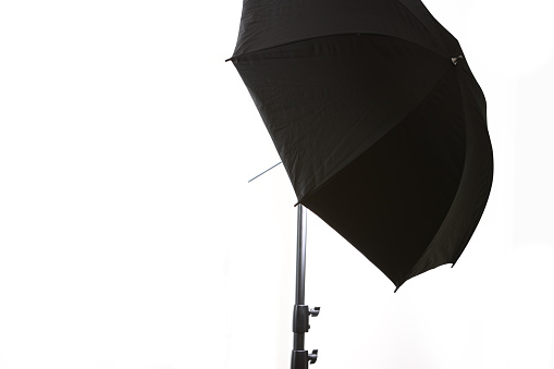 Photographic umbrella modifier on a white background