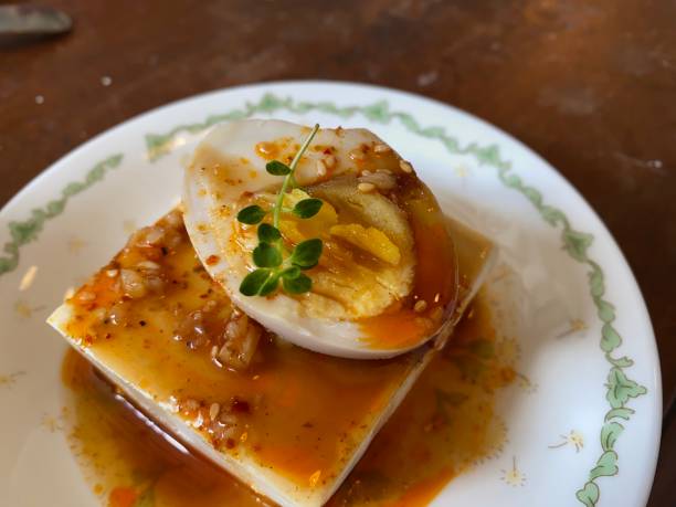 istock Tofu, serve with sesame sauce, egg and thyme 1339277344