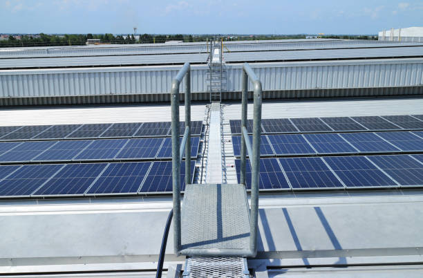 Grating Walkway on Multi-level Roof for Solar PV Rooftop System stock photo