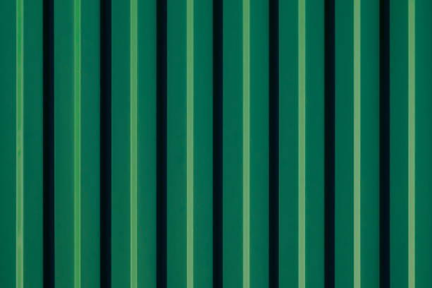 istock Dark green and green and light green vertical stripes. Background. 1339285252