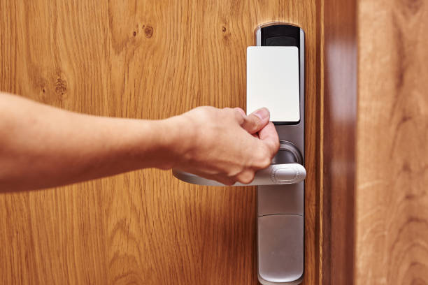 istock Hand open door digital lock with card key 1339286994
