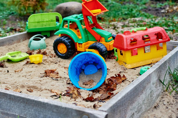 istock Children sandbox with colorful toys 1339286995