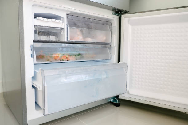 Bottom freezer of the refrigerator with drawer is opened Bottom freezer of the refrigerator with drawer is opened freezer bottom stock pictures, royalty-free photos & images