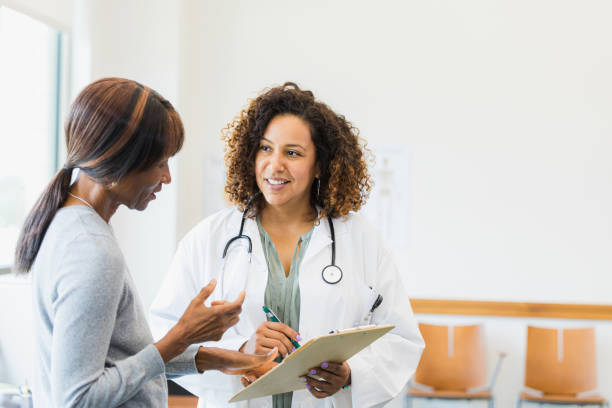 istock Doctor listens attentively as patient asks about rest results 1339289883
